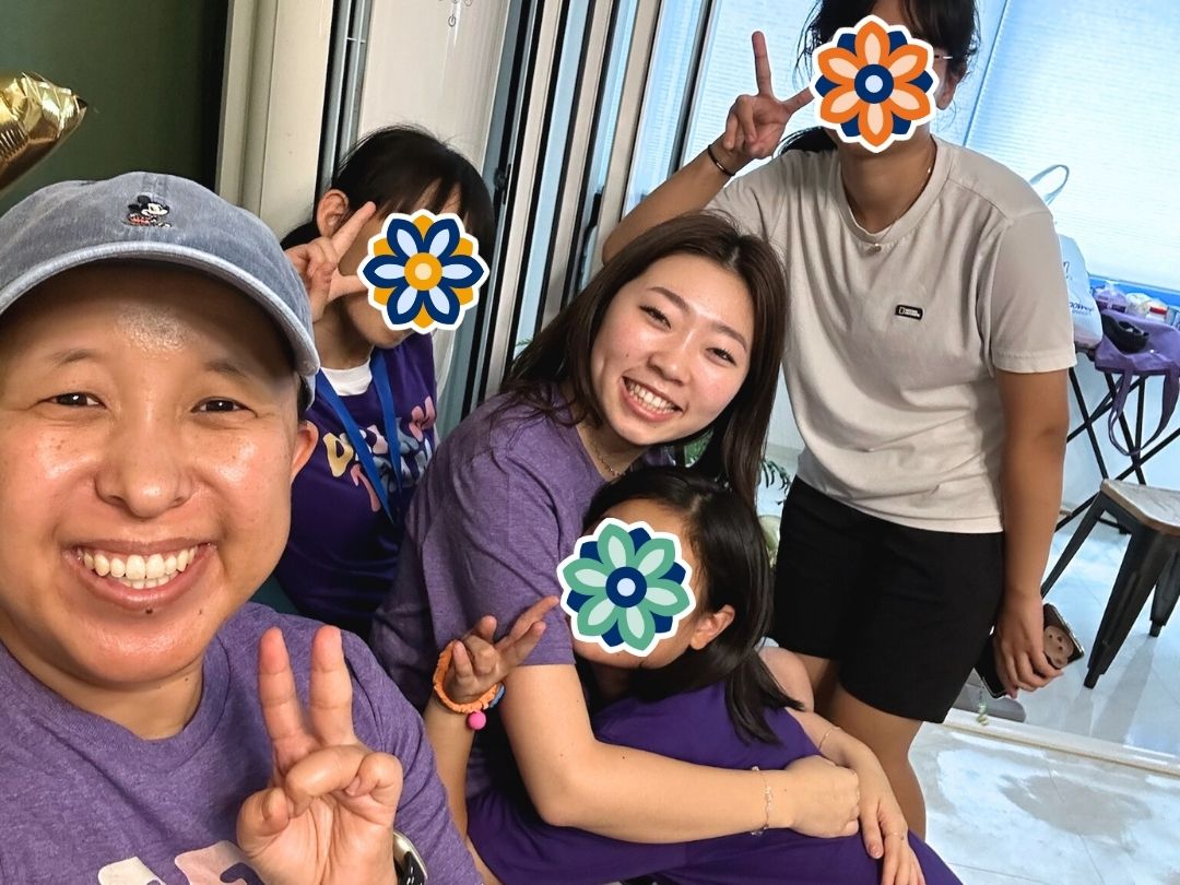 GEM Program volunteers and students posing together.